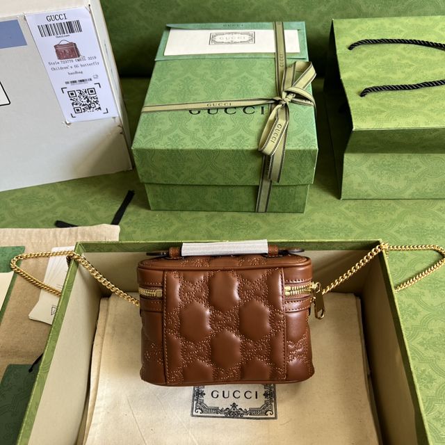 GG original matelasse leather top handle mini bag 723770 brown